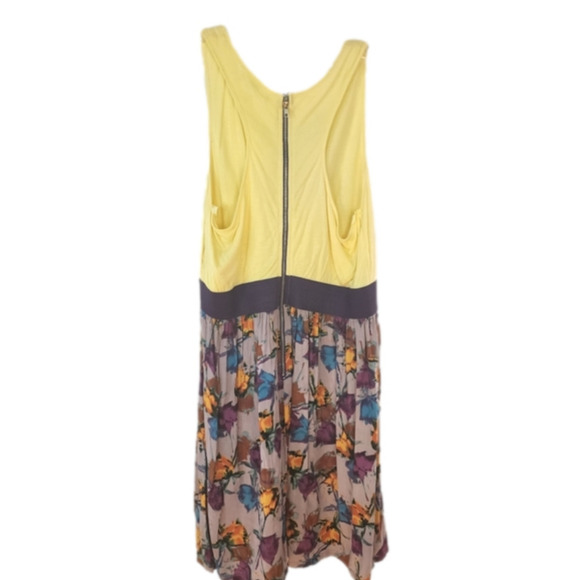 Ya sleeveless yellow top with bold multi colored bottom in a floral pattern. - Picture 2 of 9
